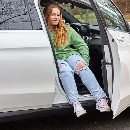 Mckenna exiting a car